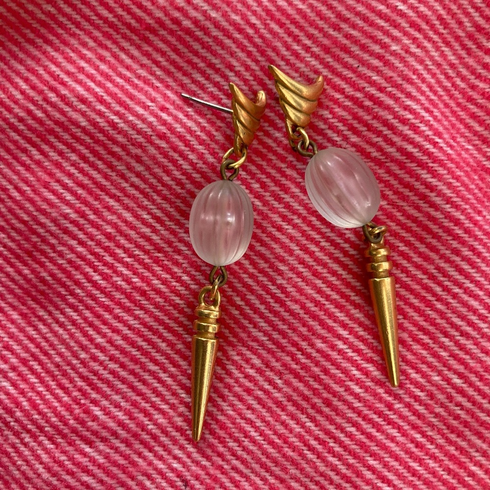 Gold metal earrings with a clear bead. Pierced.